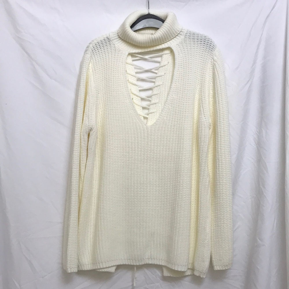 Keyhole turtle neck sweater with lace up back
